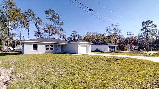 single story home featuring a front yard and a garage