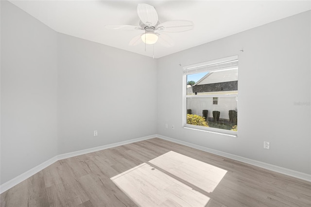 unfurnished room with light hardwood / wood-style flooring and ceiling fan