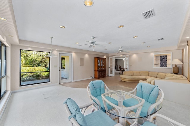 living room featuring ceiling fan