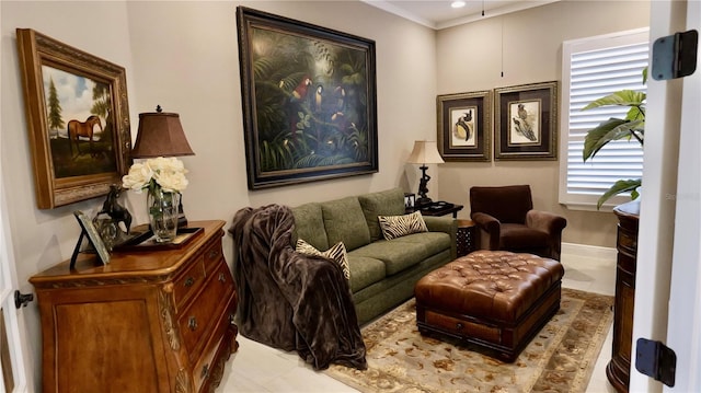 living area with ceiling fan, light tile patterned flooring, and a wealth of natural light