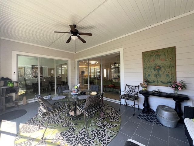 view of patio featuring ceiling fan