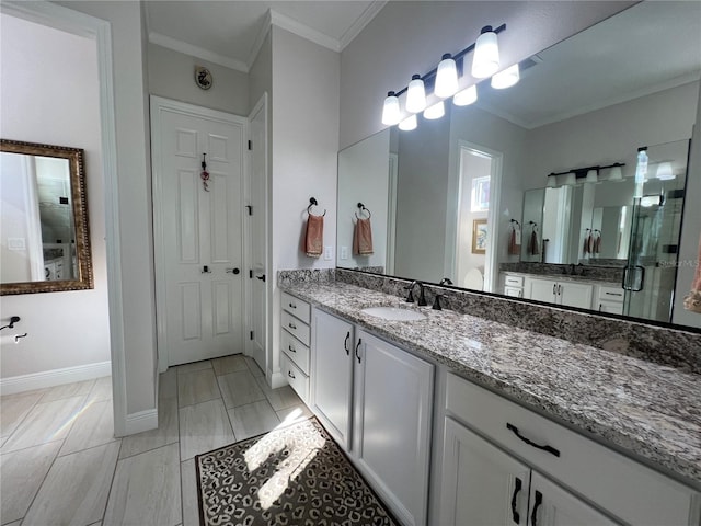 bathroom with tile patterned flooring, vanity, and ornamental molding