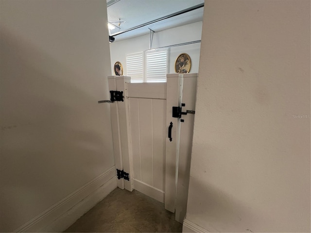 entryway featuring concrete floors