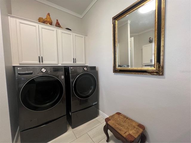 laundry area featuring washer and clothes dryer, light tile patterned flooring, cabinets, and ornamental molding