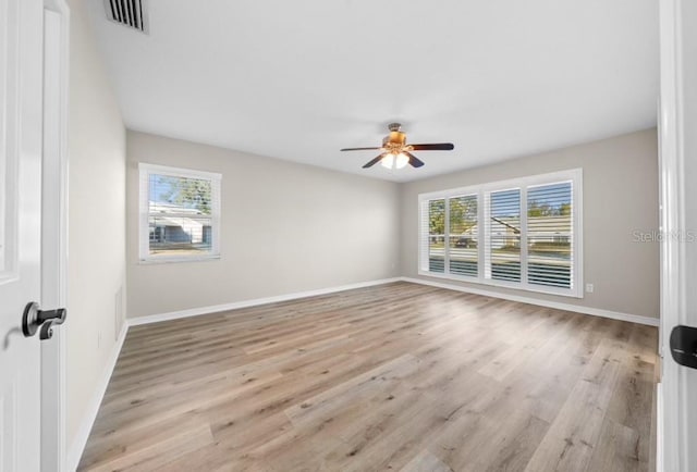 unfurnished room with ceiling fan and light hardwood / wood-style flooring