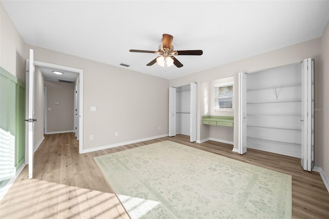 unfurnished bedroom featuring light hardwood / wood-style floors and ceiling fan