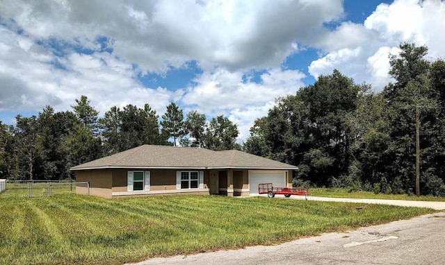 single story home with a front lawn and a garage