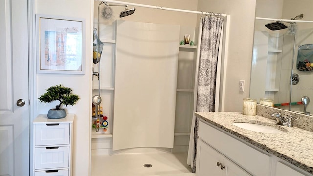 bathroom with vanity and a shower with curtain