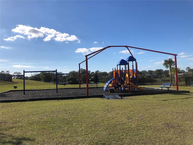 view of playground with a yard