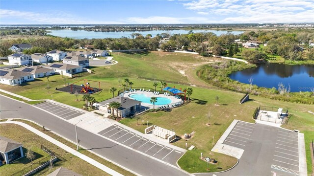 drone / aerial view with a water view