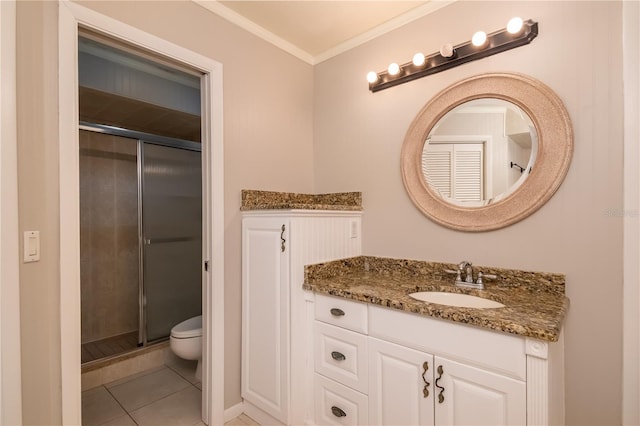 bathroom with toilet, tile patterned flooring, a shower with shower door, and ornamental molding