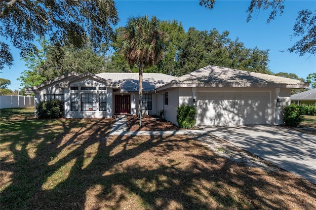 single story home with a garage