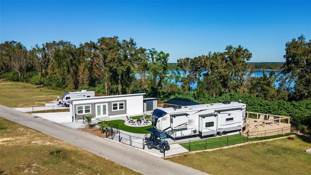 drone / aerial view featuring a water view