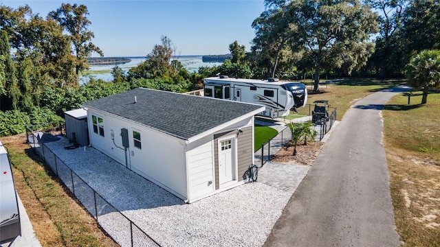 exterior space with a water view