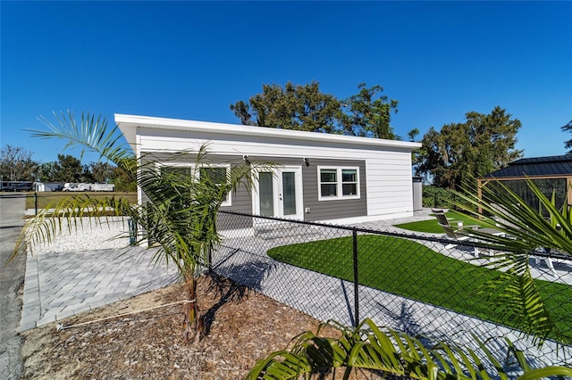 exterior space featuring a front lawn