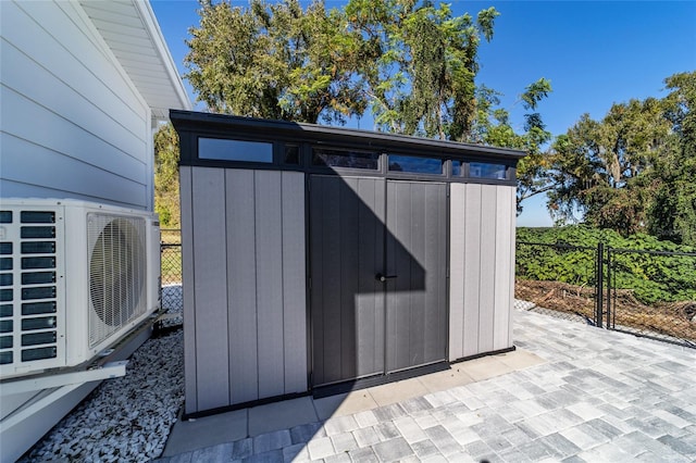 view of outbuilding with ac unit