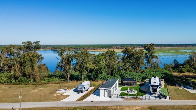 drone / aerial view featuring a water view