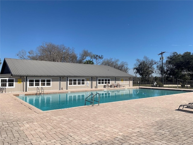 view of swimming pool featuring a patio