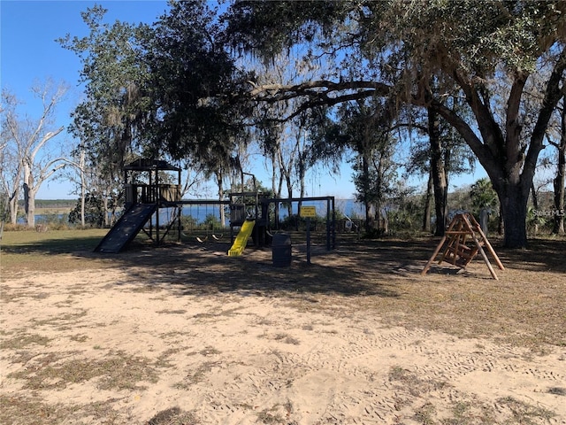 view of playground featuring a water view