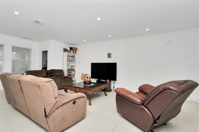 living room featuring light tile patterned flooring