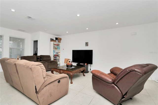 4313 SW 106th Pl, Ocala, FL 34476 - living room with light tile patterned floors and recessed lighting