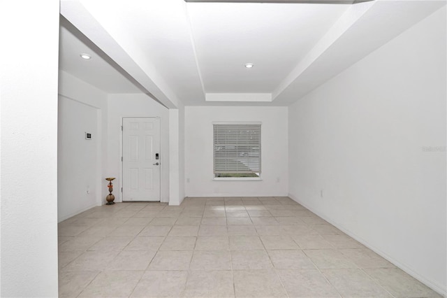 4313 SW 106th Pl, Ocala, FL 34476 - unfurnished room with light tile patterned floors, a tray ceiling, baseboards, and recessed lighting