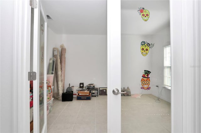 4313 SW 106th Pl, Ocala, FL 34476 - interior space with french doors and tile patterned floors