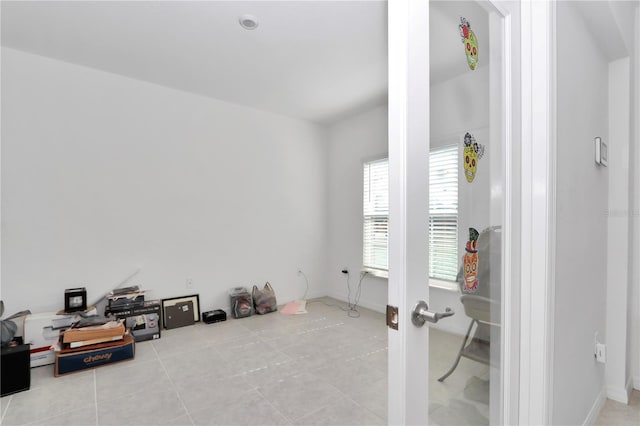 interior space with light tile patterned floors