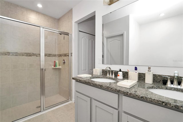 4313 SW 106th Pl, Ocala, FL 34476 - full bath with double vanity, a shower stall, tile patterned flooring, and recessed lighting