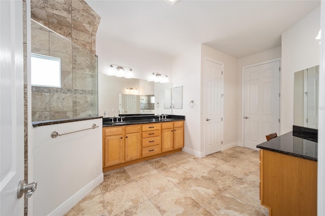 bathroom featuring vanity and walk in shower