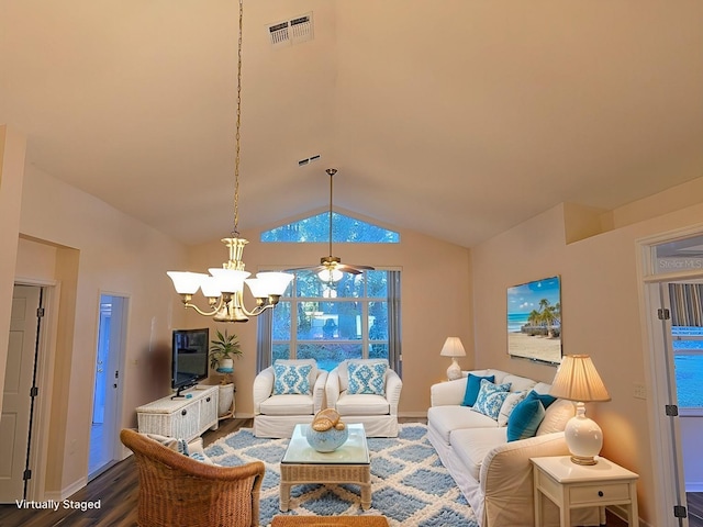 living room with vaulted ceiling, dark wood-type flooring, and a notable chandelier