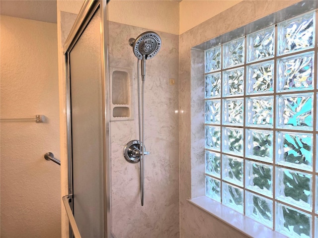 bathroom with walk in shower