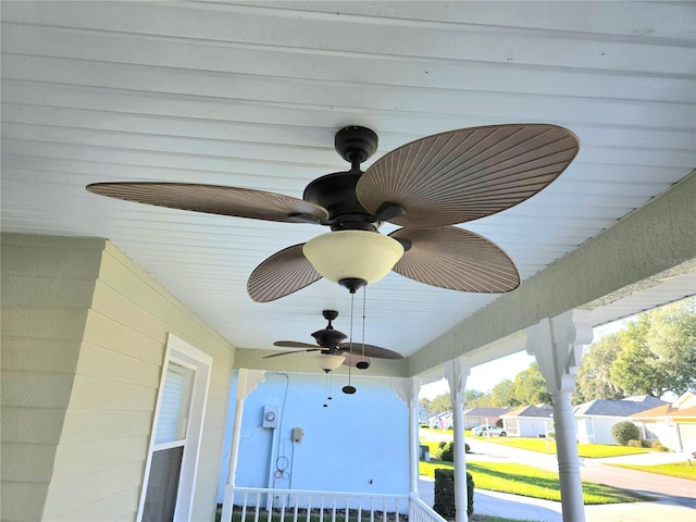 exterior details featuring ceiling fan