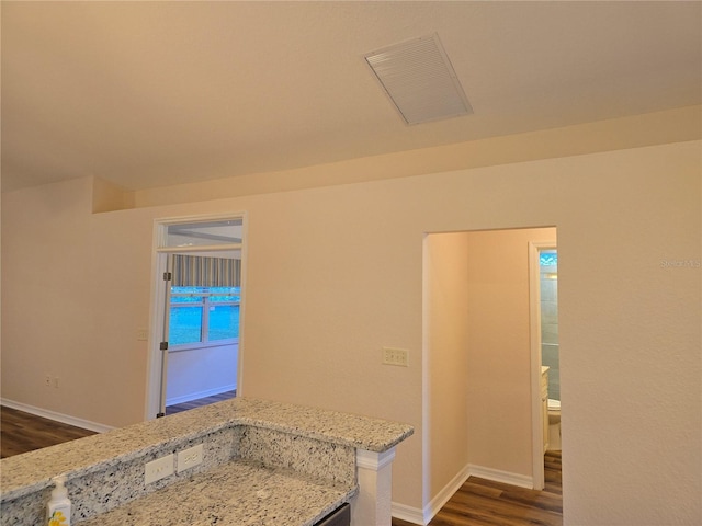 bathroom featuring toilet and hardwood / wood-style floors