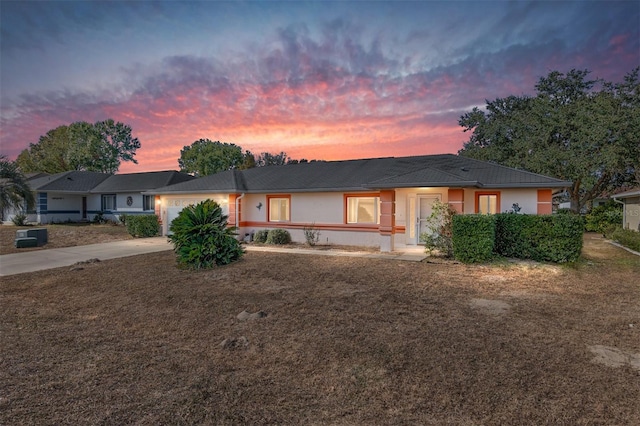 ranch-style home with a garage