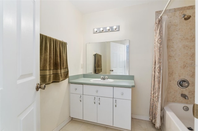 bathroom featuring vanity and shower / bath combo with shower curtain