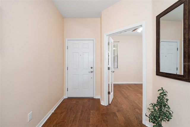 corridor featuring dark hardwood / wood-style flooring