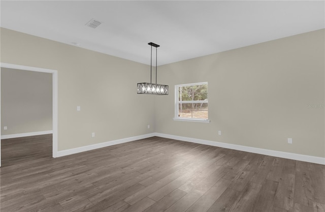 unfurnished dining area featuring hardwood / wood-style flooring