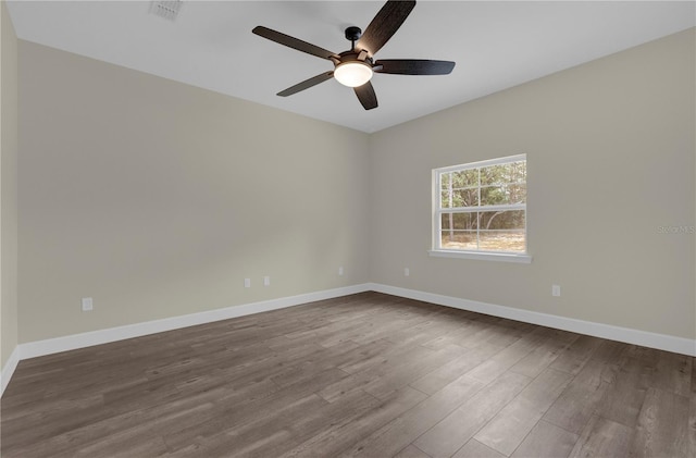 unfurnished room featuring ceiling fan and wood-type flooring