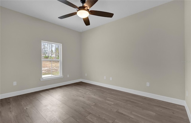 spare room featuring ceiling fan and light wood-type flooring