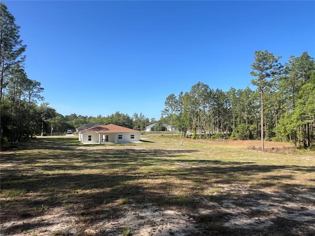 12205 SW 71st Lane Rd, Ocala, FL 34481 - view of green lawn