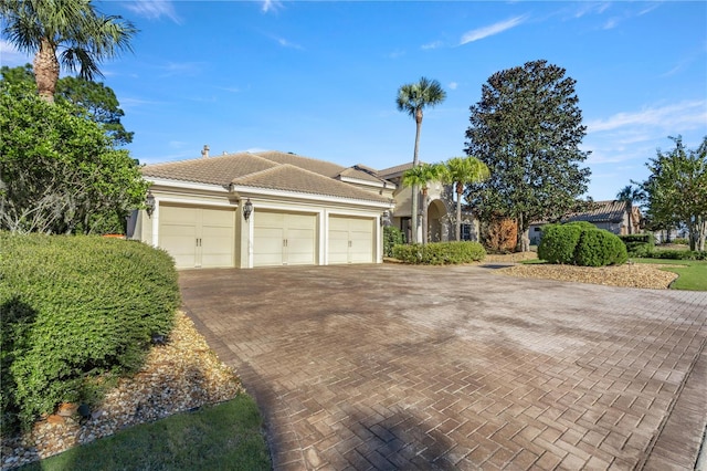 view of front of property with a garage