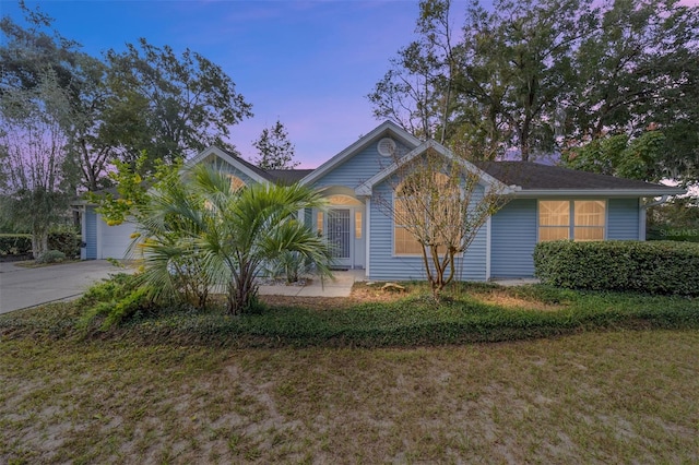 ranch-style home with a garage