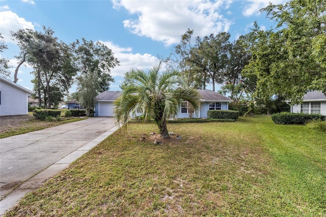 single story home with a front yard