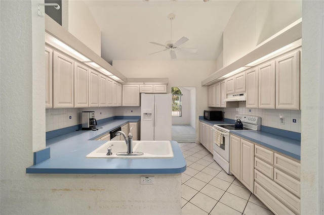 kitchen with premium range hood, high vaulted ceiling, black appliances, sink, and light tile patterned floors