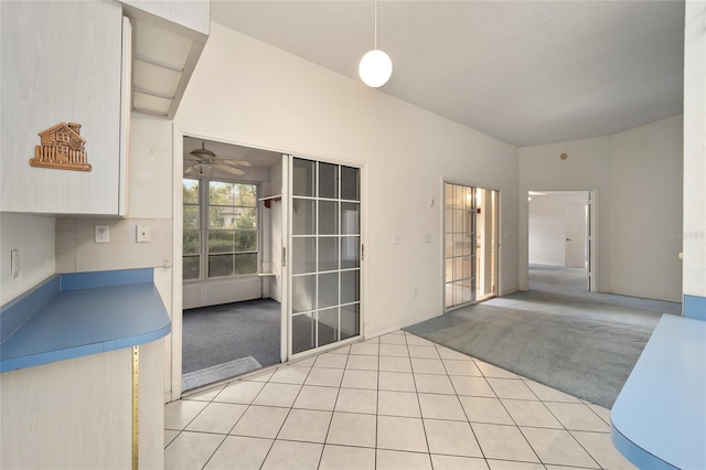 interior space featuring ceiling fan