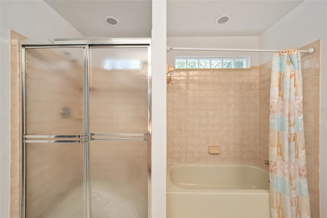 bathroom featuring a shower with curtain