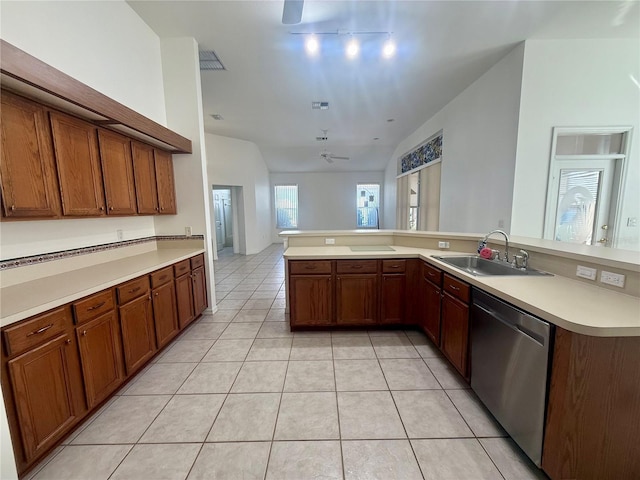 kitchen featuring light tile patterned floors, visible vents, a ceiling fan, dishwasher, and a sink