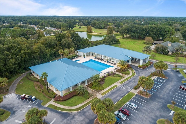 bird's eye view featuring a water view and a view of trees