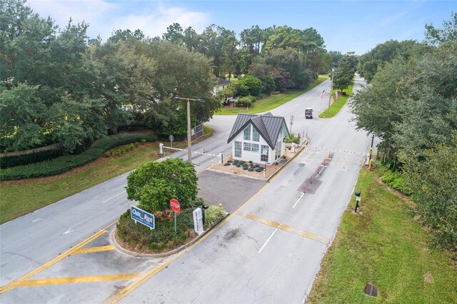 6688 SW 113th Pl, Ocala, FL 34476 - aerial view of property and surrounding area with a tree filled landscape